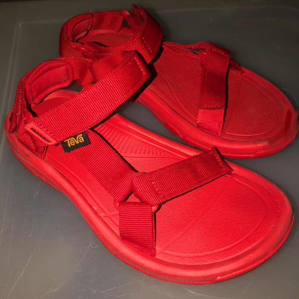 All red Teva sandals